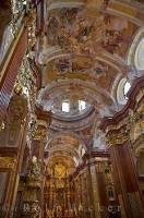 The ceiling of the Abbey Church at Stift Melk in the town of Melk in Austria, is decorated with an array of beautiful paintings.