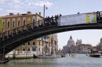 One of the bridges that crosses the Grand Canal in Venice, Italy is the Accademia Bridge.