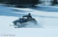 Stock photo of a Polaris Snowmobile in Newfoundland being put to the test
