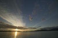 Stock photo of a sunset over the inside passage waters.