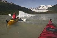 Kayaking on Mendenhall Lake at the glacier is a great way to spend time on a adventure vacation in Alaska.