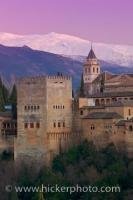 The Alhambra, a fabulous example of a Moorish citadel and palace, with the Sierra Nevada mountains in the background. This view can be seen from the Mirador de San Nicolas in Albayzin, City of Granada, Andalusia, Spain.