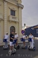 A novel mode of transport during a tour of the America's Cup Village in Valencia is by electric two wheelers.