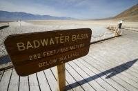 A sign showing that the Badwater Basin is 282 feet below sea level in Death Valley, California, USA.