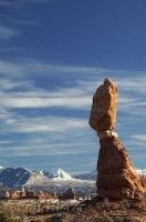 A rock keeping its balance on a sandstone pedestal, this is Balanced Rock in Arches National Park of Utah, USA. 