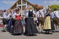 A group of dancers perform at the Maibaumfest in Putzbrunn, Germany.