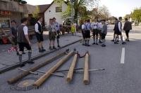 Men await the arival of the Maibaum during the Maibaumfest in Putzbrunn, Bavaria, Germany.