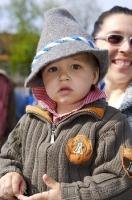 A young child is dressed to the nines during the Bavarian Maibaumfest celebrations in Putzbrunn, Germany.