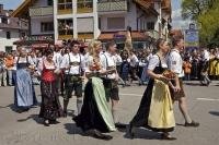 Residents dance as couples at the Bavarian Maibaumfest in Putzbrunn, Germany.