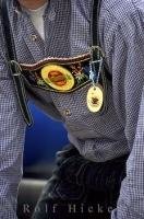 The traditional Bavarian German lederhose worn by men at the Maibaumfest in Putzbrunn, Germany.