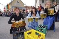The job of the beer girls is to ensure that the working men are supplied with the tasty Bavarian beverage.
