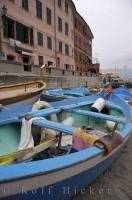 Blue boats moored in the harbour of Vernazza, one of the small villages of Cinque Terre in the Liguria region of Italy.