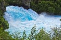 A waterfall with a unique blue coloring to it is Huka Falls, located near Taupo on the North Island of New Zealand.