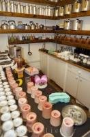 Moulds, wax, and cookers make up some of the equipment needed for making hand crafted candles.