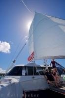The skipper on the Carino catamaran enjoys her life style of taking passengers out in the Bay of Islands in New Zealand on a daily basis during the summer months.