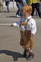 A traditionally dressed boy during the Maibaumfest in Putzbrunn, Germany.