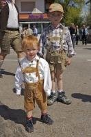 Children enjoy the celebrations during the Maibaumfest in Putzbrunn, Germany.