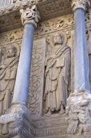 The ornate Eglise St Trophime pillars on the exterior of the church in the city of Arles, Provence in France, Europe.