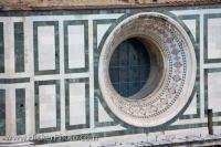 One of the eight circular windows under the dome of the Florence Duomo in the city of Florence in the Region of Tuscany in Italy, Europe.