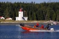 The Canadian Coast Guard arrives at the Pulteney Point Lighthouse on Malcolm Island in British Columbia, Canada.