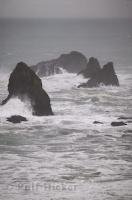 Rocks are pounded along the the rugged Pacific Coast of California, USA.