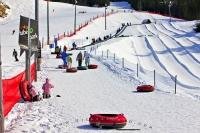 A fun and adventurous winter activity which is suitable for the whole family, the Coca Cola Tube Park on Blackcomb Mountain is easily accessed from Whistler Village in British Columbia, Canada.