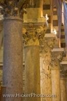 Ornate and decorative columns adorn the interior of the Duomo cathedral in Pisa, which is a city and province in Tuscany. This is a UNESCO World Heritage Site that is visited by thousands of tourists every year.