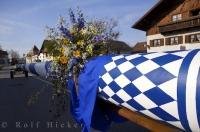 The decorated Maibaum is ready to be wheeled into the town centre of Putzbrunn in Bavaria, Germany.