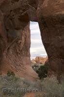 Pine Tree Arch is situated along the Devils Garden trail in Arches National Park in Utah, USA.