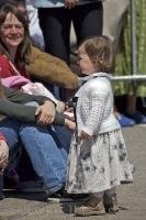 A small girl wears her dirndl at the Maibaumfest in Putzbrunn, Germany.