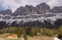 Snow still partly covers the Dolomite Range in the spring near the town of Tires in South Tyrol, Italy, Europe.