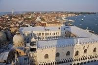 The Ducal Palace, the domes of Saint Marks Basilica and a panoramic view of Saint Marks Basin in Venice, Italy.