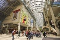 The interior of Eaton Centre in the downtown area of Toronto, Ontario in Canada where people spend many hours shopping.