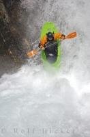 Plunging into the froth at the bottom of the Sauth deth Pish during an extreme kayaking adventure in Catalonia, Spain.