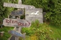 Directions around Lagoon Cove on Vancouver Island are marked with handcrafted signs to help any tourists find the local attractions.