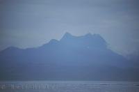 Looking across the water at Vancouver Island you can watch the haze from the sunrise float around the mountain top.