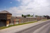 Driving along the road in Fort MacLeod in Southern Alberta you can see the exterior wooden walls of the Fort Museum.