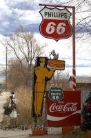 Some old road signs from the 50s look funny along Route 66 in Seligman, USA.