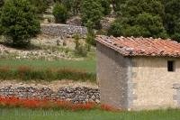 A quaint stone garden shed in a field near the village of Morella, El Maestrat, Valencia, Spain.