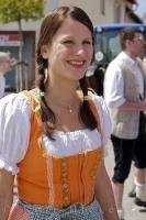 A dirndl is the traditional dress for German women seen here at the Maibaumfest in Putzbrunn, Germany.