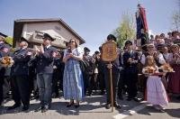 Town residents and clubs gather around the Maibaum during the Maibaumfest in Putzbrunn, Germany.