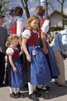 Two young girls wearing the traditional Bavarian dirndl at Putzbrunn, Germany.