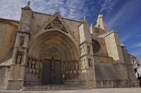 The magnificent Gothic portal of the Basilica de Santa Maria la Mayor welcomes all who visit the village of Morella in the El Maestrat in Valencia, Spain.