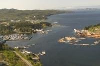 The town site of Port Hardy with bustling Hardy Bay in the foreground looking north towards Queen Charlotte Strait on the coast of British Columbia.