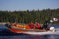 A team with the Coast Guard in an inflatable rescue boat near Malcolm Island in BC, Canada.
