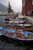 Boats moored in the town of Torbole on Lake Garda in the pristine region of Trentino-Alto Adige, Italy.