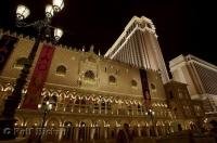 The intricately designed building of The Venetian Resort Hotel Casino in Las Vegas, Nevada, USA aglow during the evening hours.