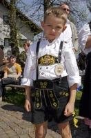 A young boy poses in his traditional lederhose in Putzbrunn, Germany.