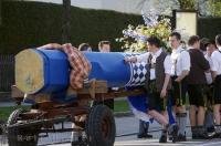 A group of men wearing traditional lederhosen will escort the Maibaum into the public arena in Putzbrunn, Germany.