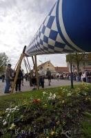 The Maibaum in an elevated position during the Maibaum festival in Putzbrunn, Bavaria, Germany.